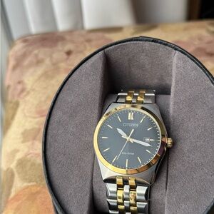 Citizen two toned Corso eco drive for men.